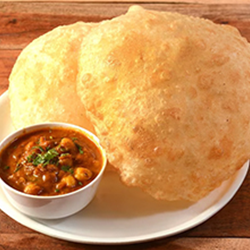 Thursday Special Chana Bathura spicy chickpea curry with fried fluffy bread