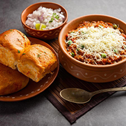 Friday Special Pav Bhaji spiced mashed vegetable curry with buttered bread rolls